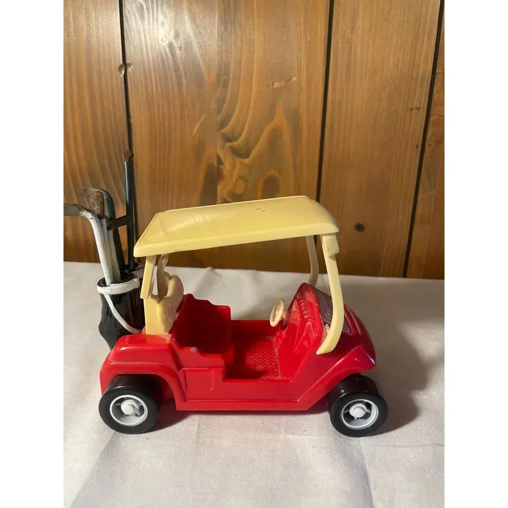 Vintage plastic toy golf cart